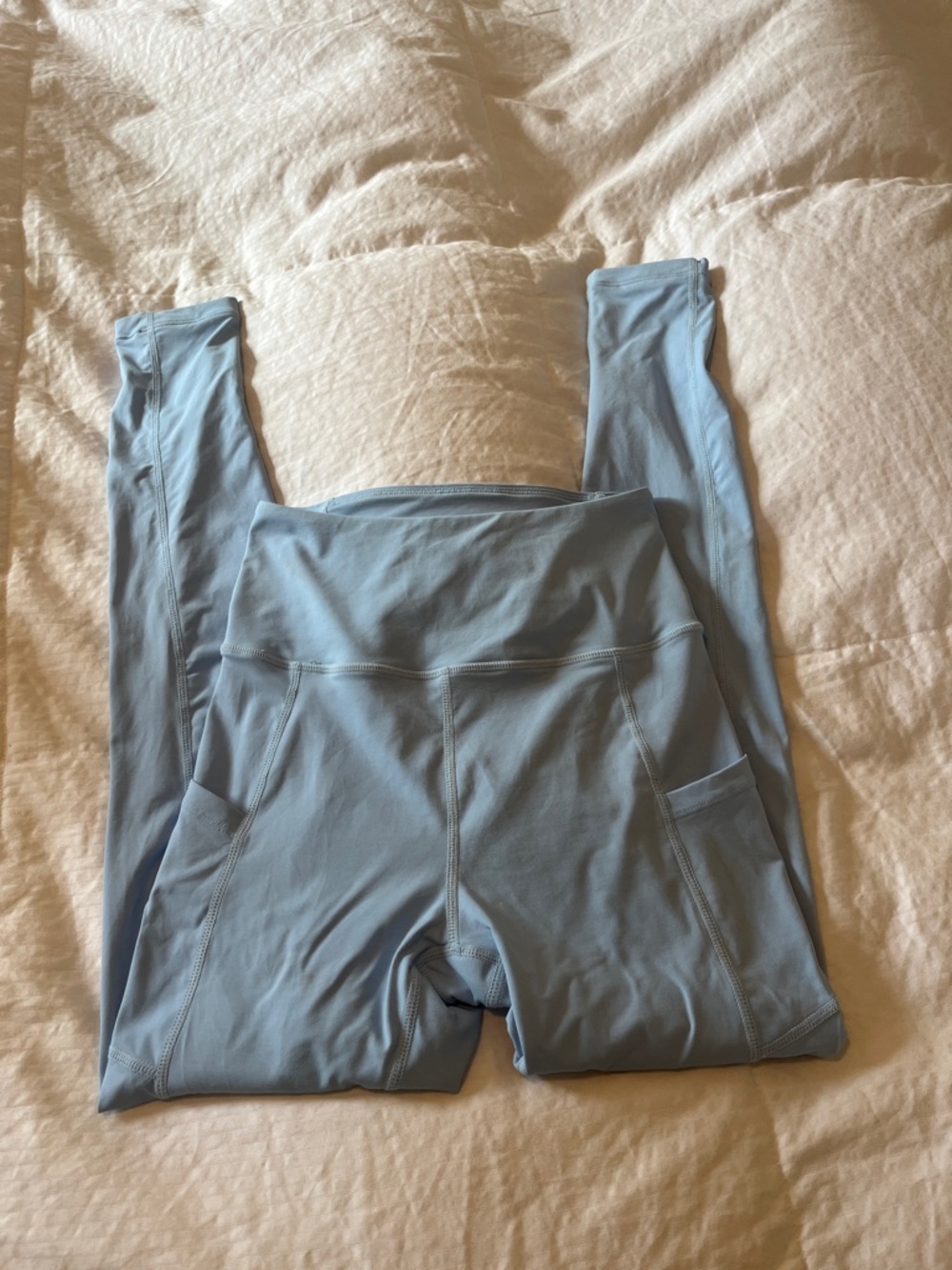 High-Rise Light Blue Leggings with Side Pockets